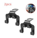 Pack of two black ABS plastic multifunction car hooks for mounting on dashboard or console.