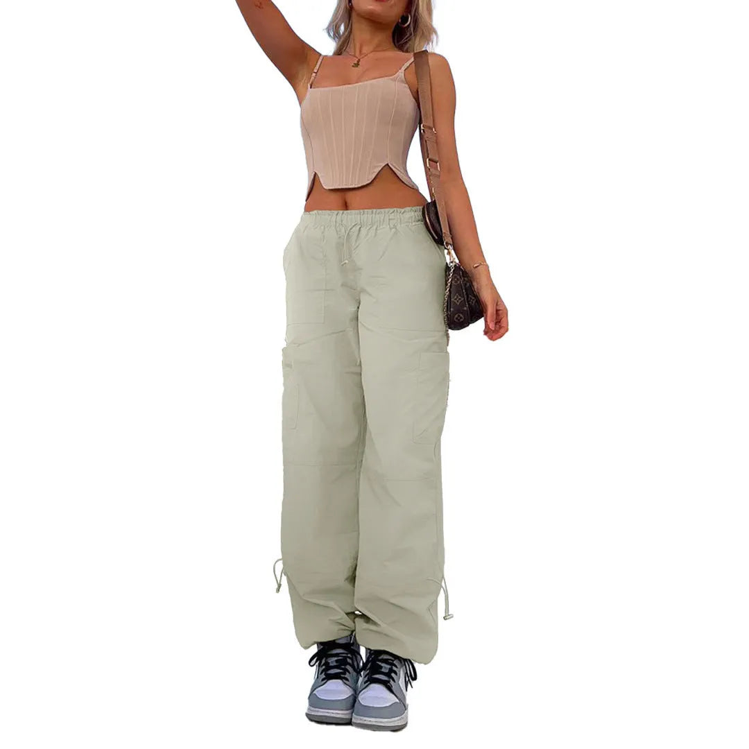 Multi-pocket straight-leg cargo casual pants in a light blue colour on a neutral background.