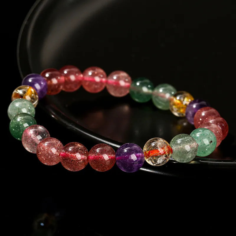 Natural tourmaline colour strawberry quartz bracelet with round geometry beads.