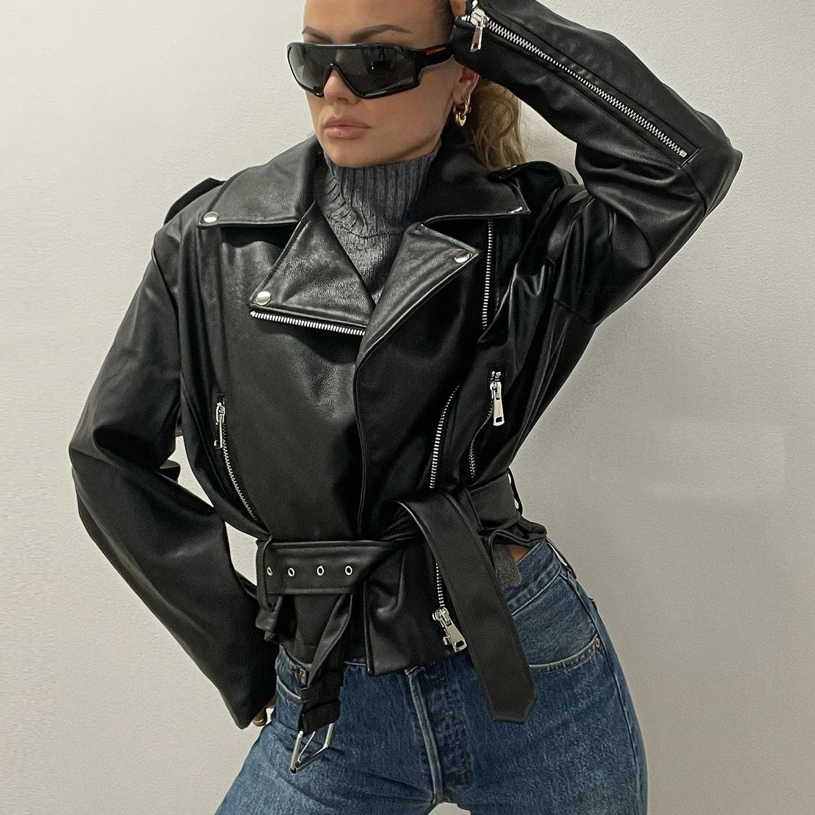 Punk style short belt lapel locomotive jacket in polyester leather, available in black, blue, and green.