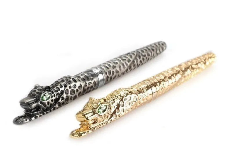Metal embossed pen for business gifts in Ancient Silver or Gold finish on white background.