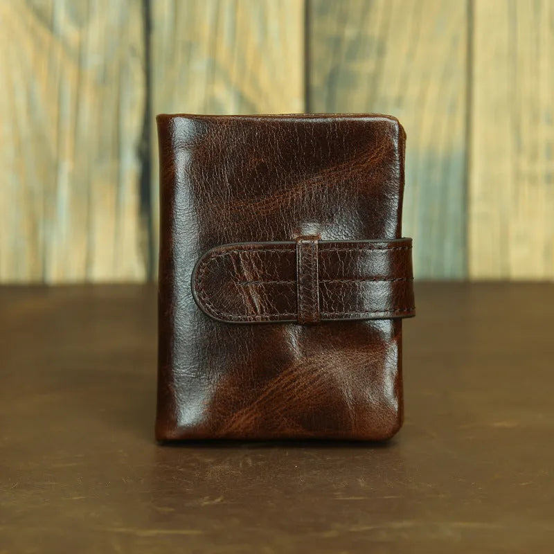 Genuine leather women's wallet in black showing vertical style with multiple card slots