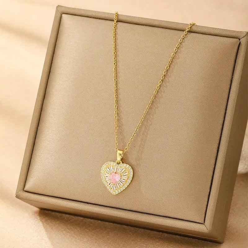 Women's copper necklace with electroplated finish showing heart, butterfly, cross, and round diamond pendant options