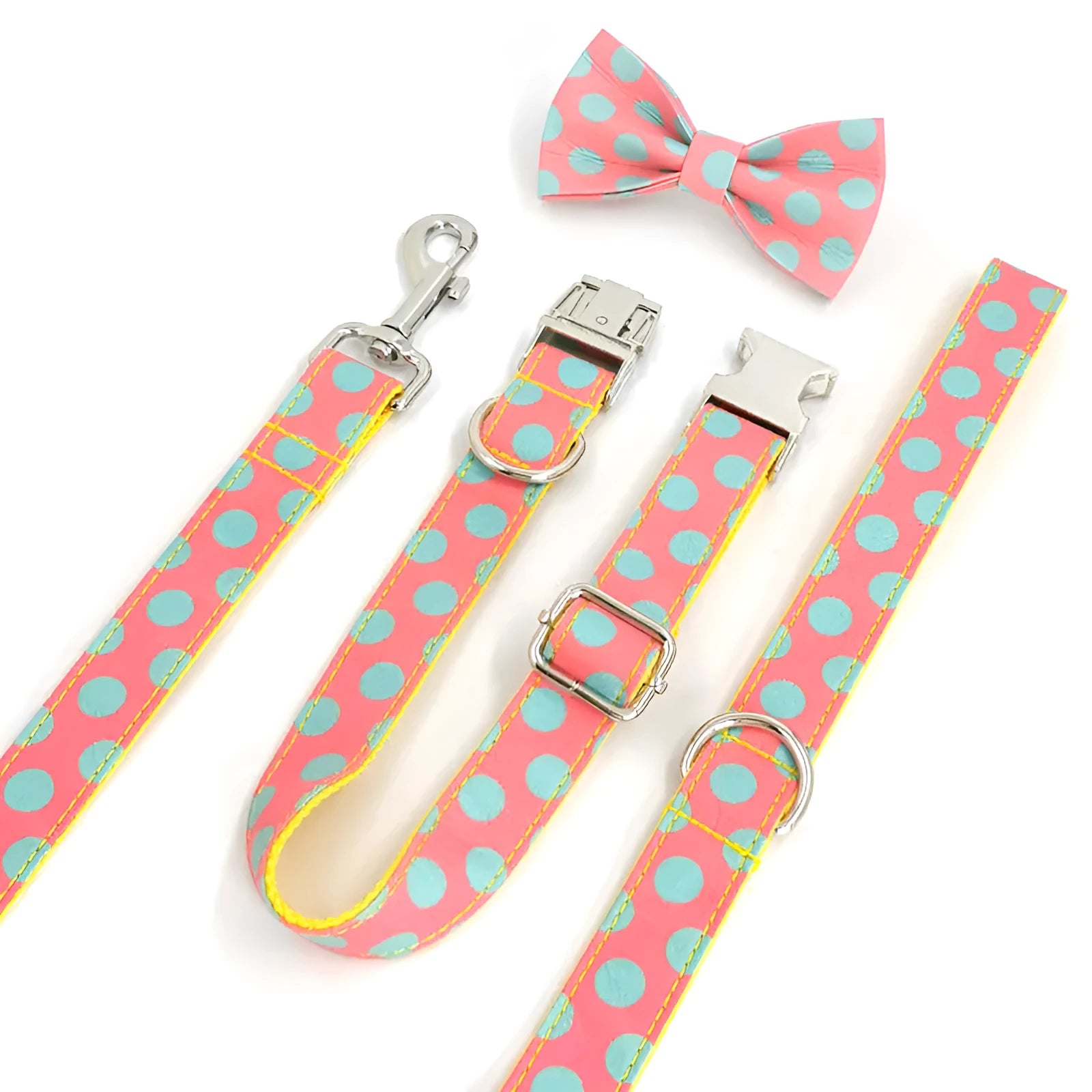 Yellow polka dot dog collar with bow and matching lead rope set on a white background.