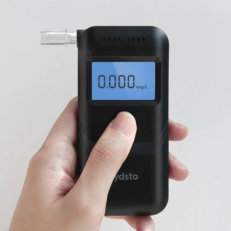 Black HD-JJCSY01 household alcohol breath tester unit on white background