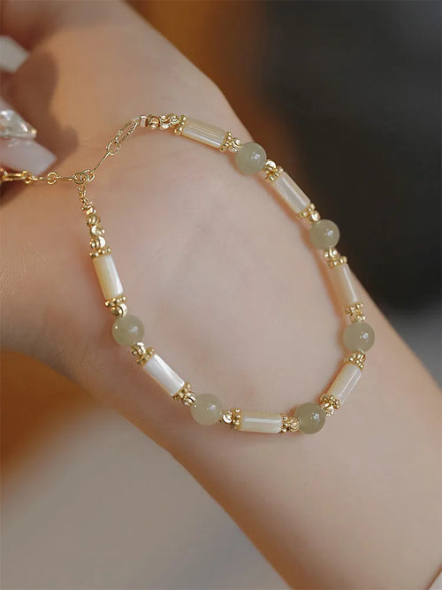 Hetian jade women's bracelet with bamboo joint design and 6mm beads.