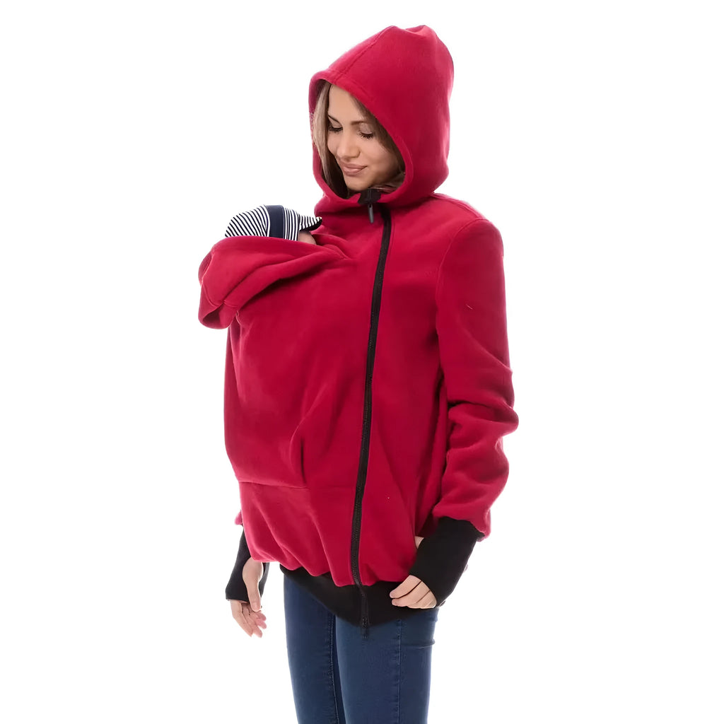 Red loose-fitting women's polar fleece sweater with long sleeves on a hanger.