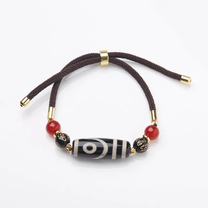 Handmade agate Dzi bead bracelet with 8mm beads in a Tibetan ethnic style.