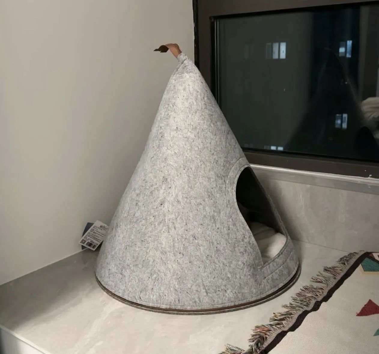 Grey handmade felt cone cat house with 50cm diameter base