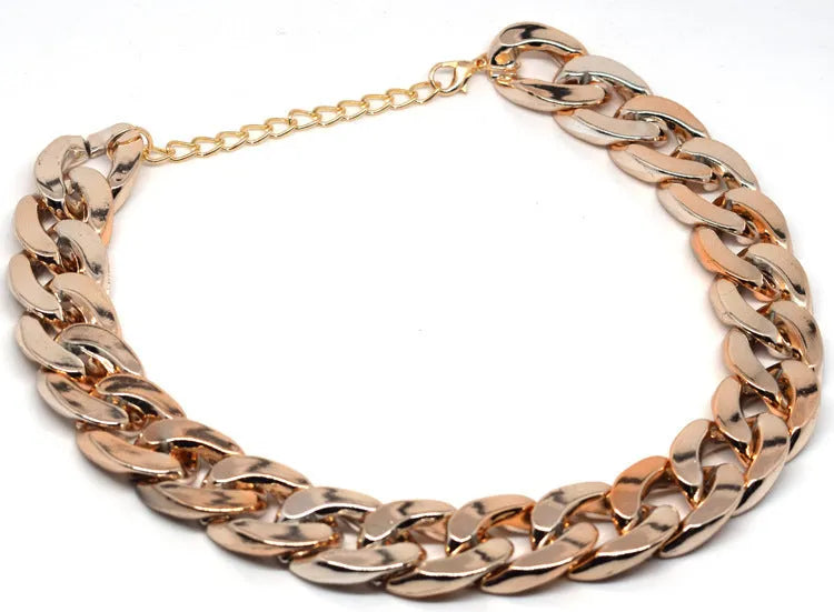 Geometric plastic resin dog collar chain necklace in gold or white on a small dog model