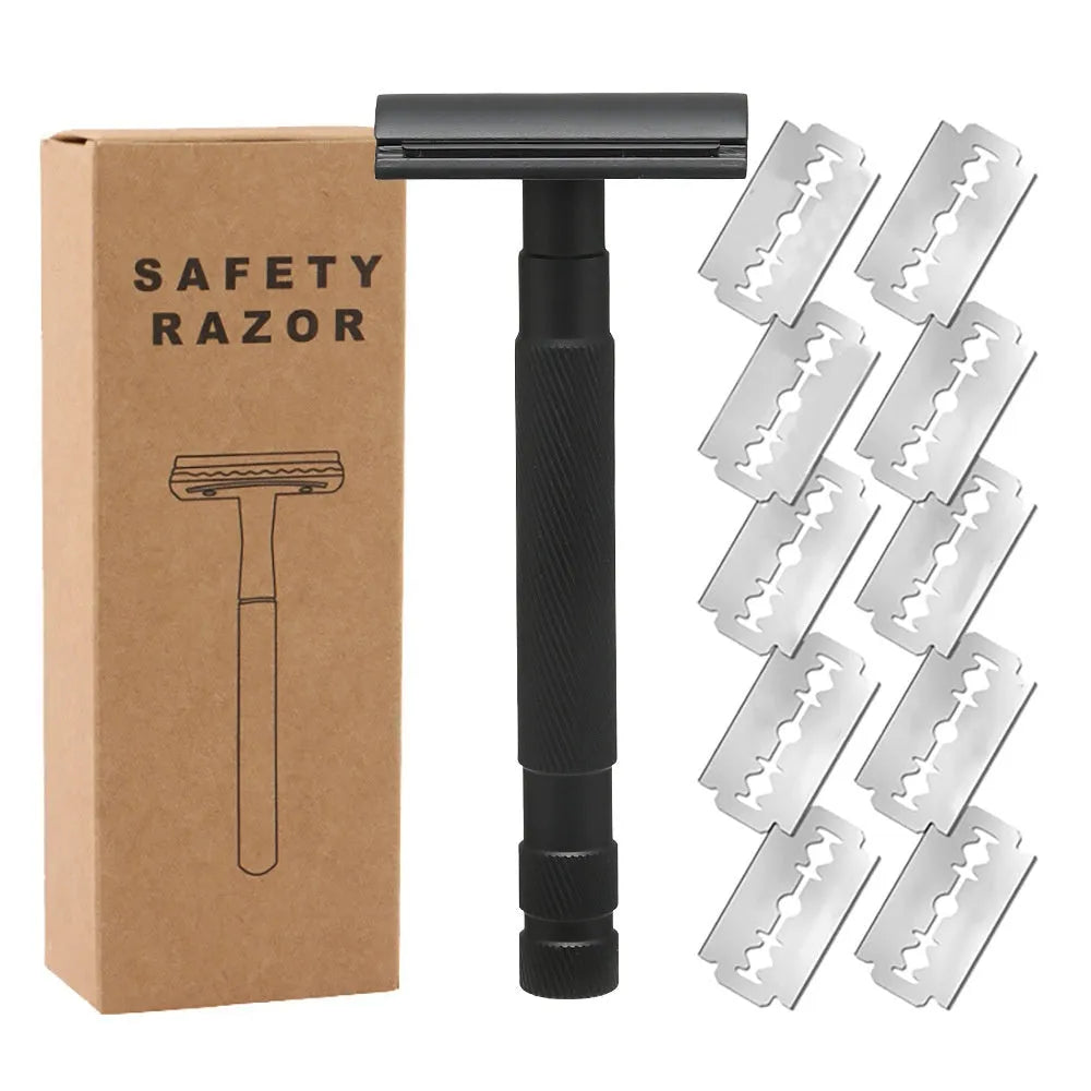 Manual double-sided safety razor with alloy handle, shown with replacement blades on a towel.