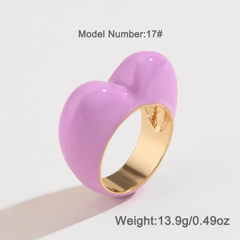 Three-dimensional enamel heart ring in zinc alloy showing raised design detail