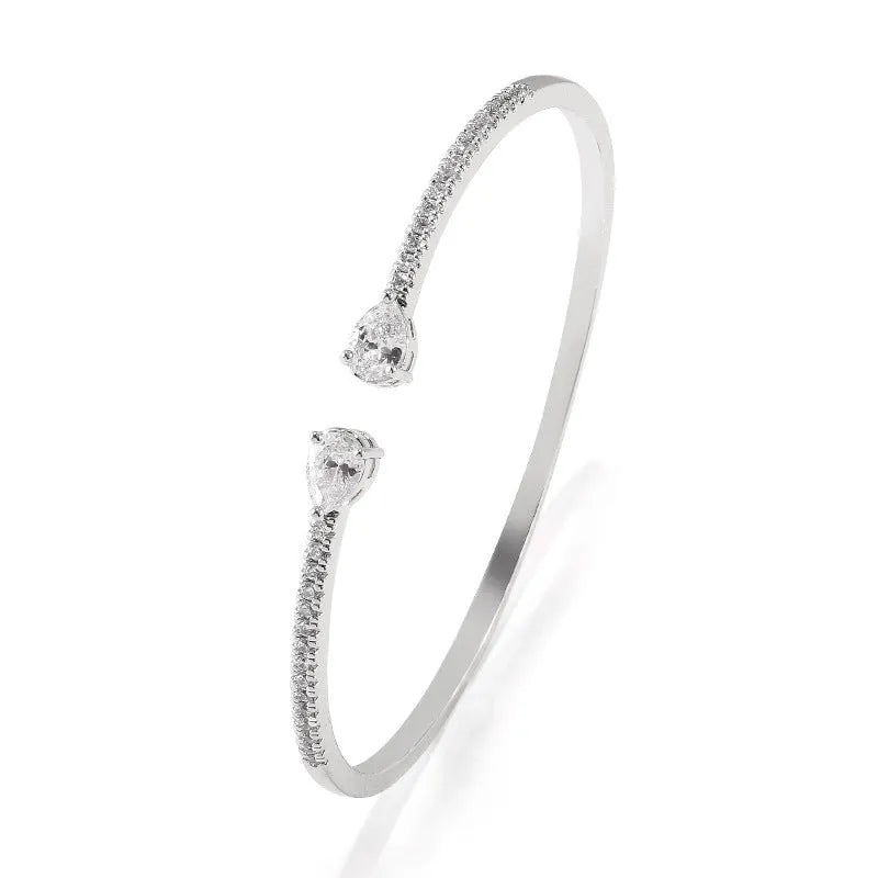 Copper personalised bracelet with multi-zircon inlay detail in white or blue colour