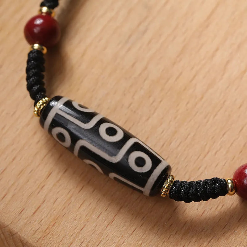 Adjustable Tibetan agate dzi bead bracelet showing traditional bead patterns