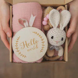 Baby teething toy gift set with bamboo cotton blanket and natural beech wood components