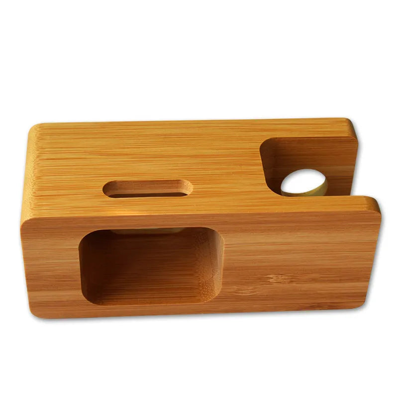 Bamboo carved phone stand with round carving design on office desk, 149mm tall smartphone holder