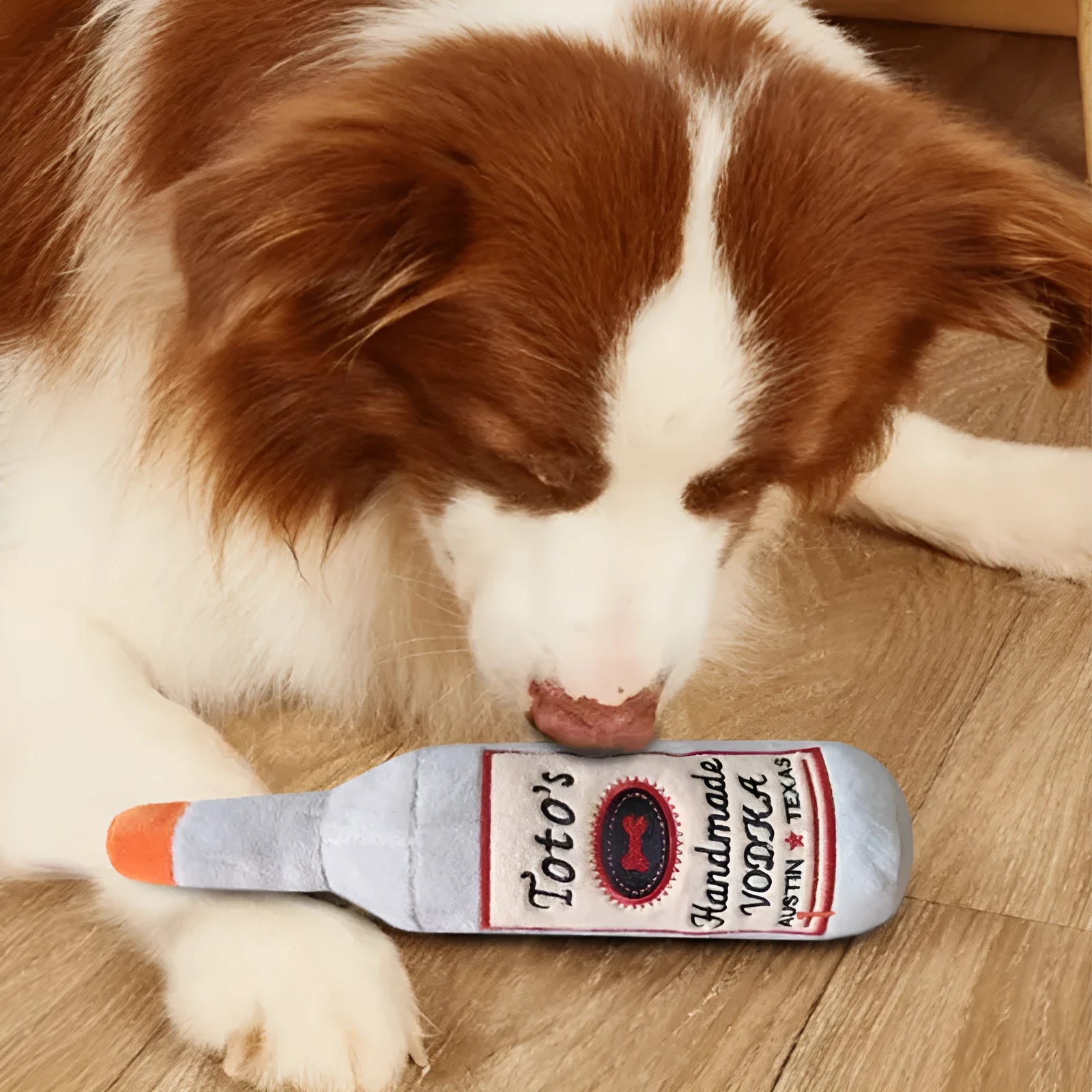 Brown plush dog toy shaped like a wine bottle with squeaker for chew play