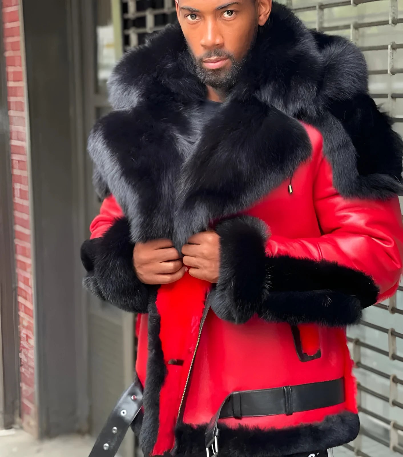 Red men's polyester jacket with thick fur collar, lapel, and zipper front on a plain background