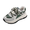 Men's and women's retro platform sneakers in banana green with suede upper, cross strap, and lace-up closure