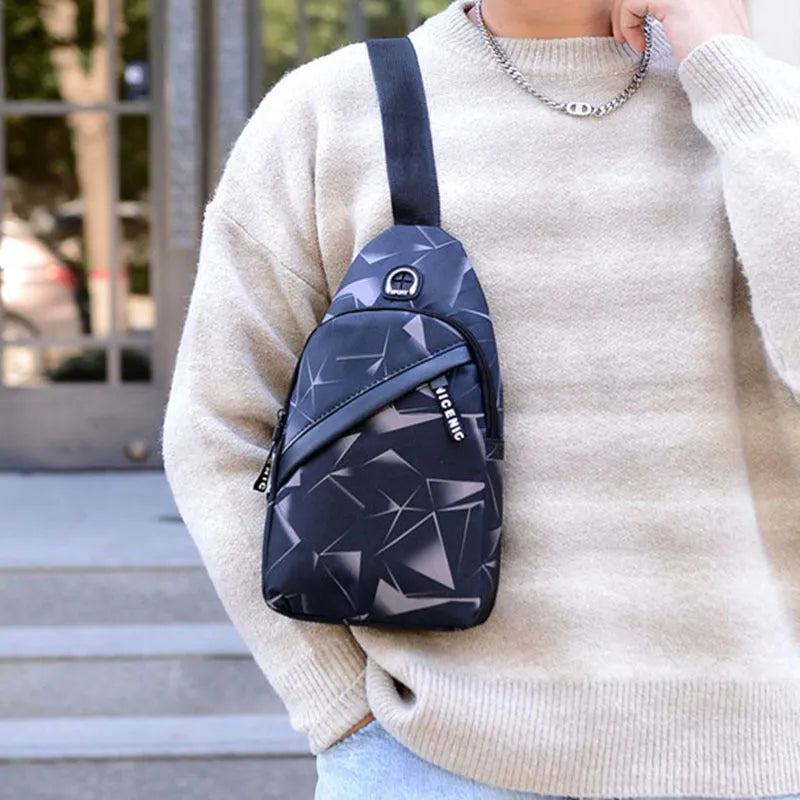 Print sling chest bag with earphone hole design in Oxford cloth, showing zipper opening and square vertical shape