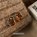 Handmade alloy geometric tassel earrings for women with electroplated finish, three styles: round piece, amber, and tigereye