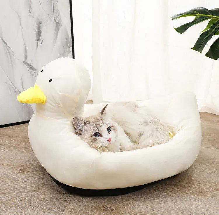 Blue duck-shaped fluffy pet bed for small dogs and cats with unique pattern
