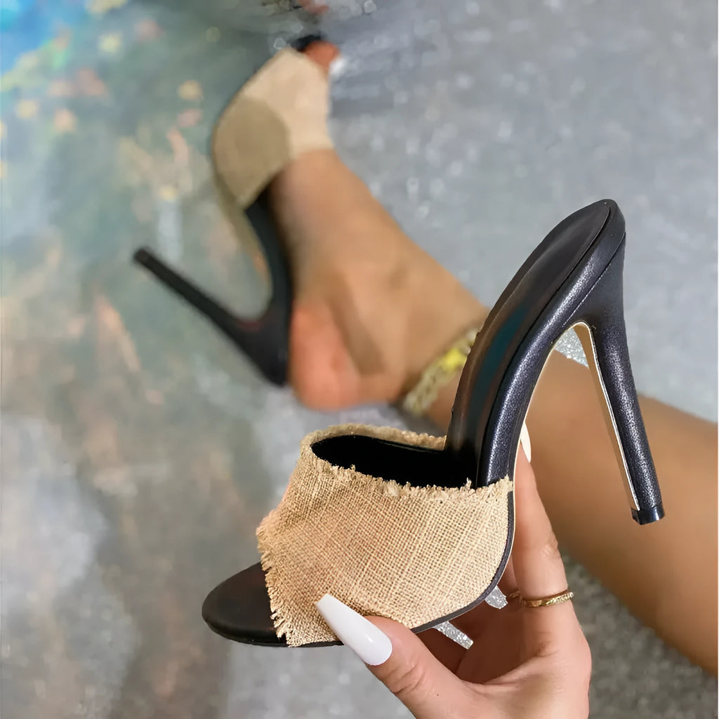 Apricot coloured women's stiletto sandals with a toe bracket design, showing sheepskin and fur upper with cowhide stitching.