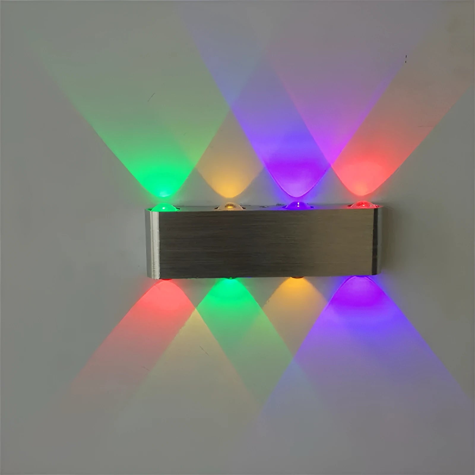Silver aluminium rectangular LED wall lamp with multicolour lighting options on bedroom wall