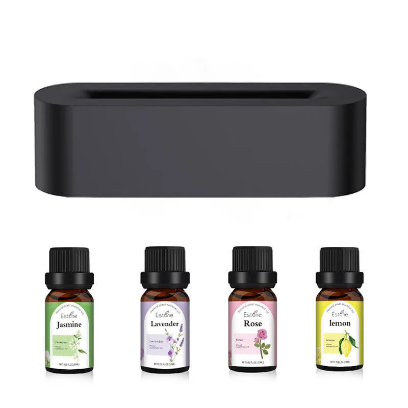 White square ultrasonic flame aroma diffuser and humidifier with LED light on a table.