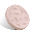 Pink whale-shaped cat slow feeding bowl with raised edge and non-slip base on a floor