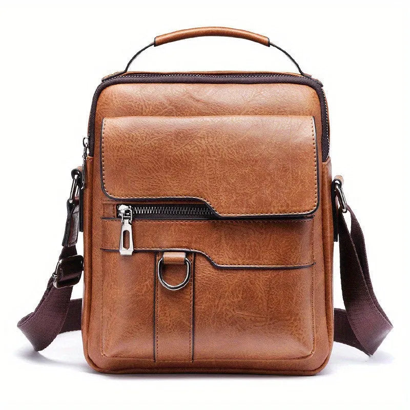 Men's brown PU leather crossbody messenger bag with metal zipper and adjustable strap on a plain background