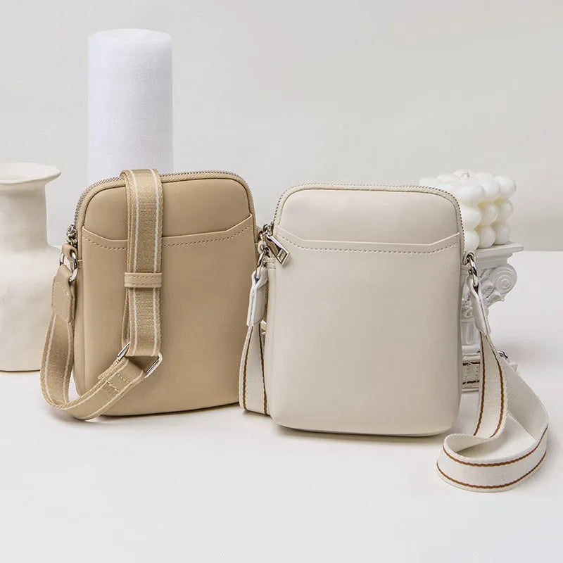 Solid colour mobile phone crossbody bag for women in black, beige, khaki, or green.