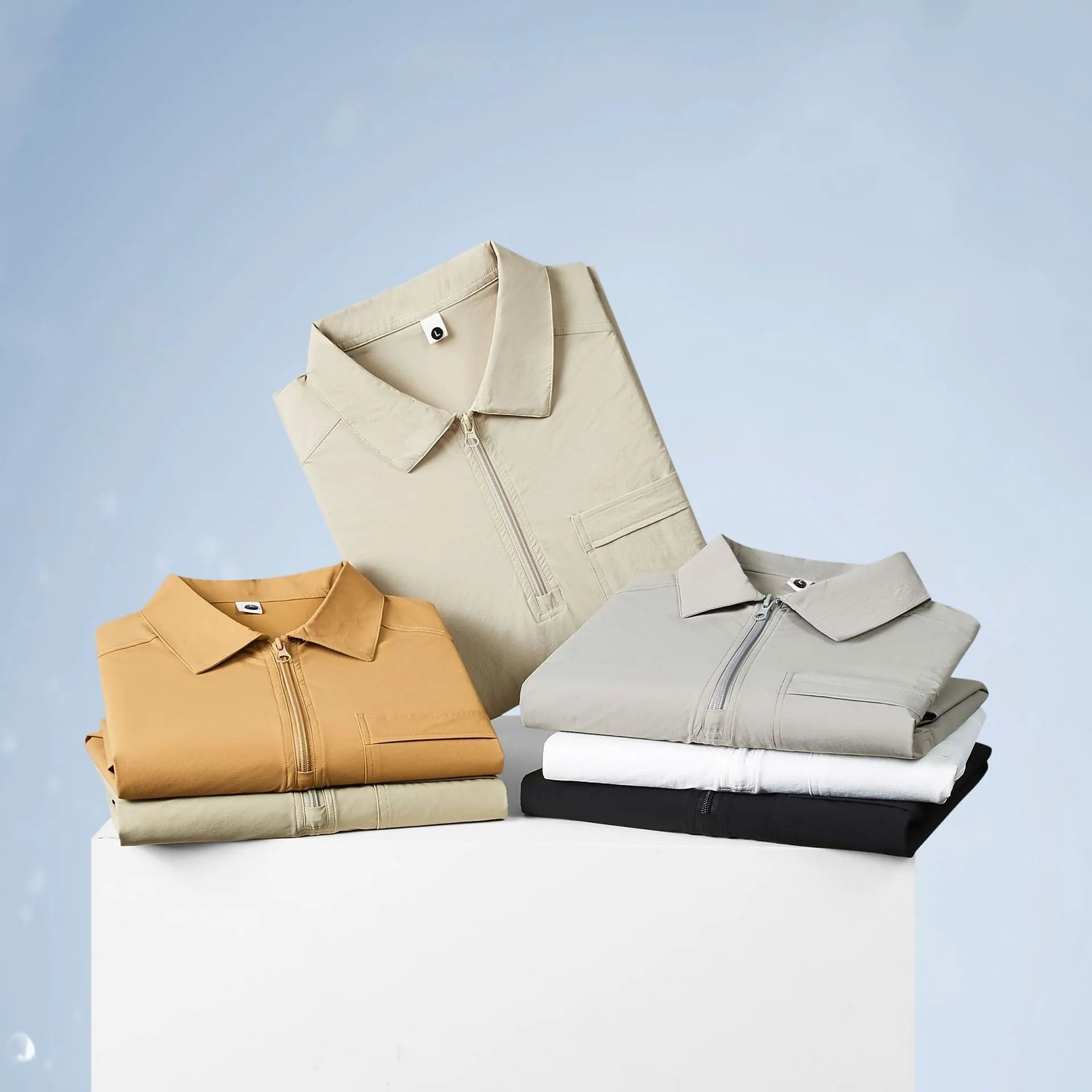 Short sleeve nylon shirt with multiple zippered pockets on the lapel, shown in silver grey.