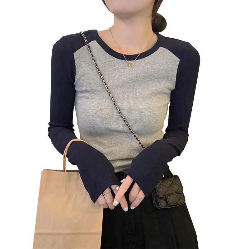 Women's slim fit viscose top with long princess sleeves in dark blue, short 40cm length.