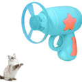 Blue interactive cat toy gun with plastic Frisbee on launch mechanism for indoor hunting play