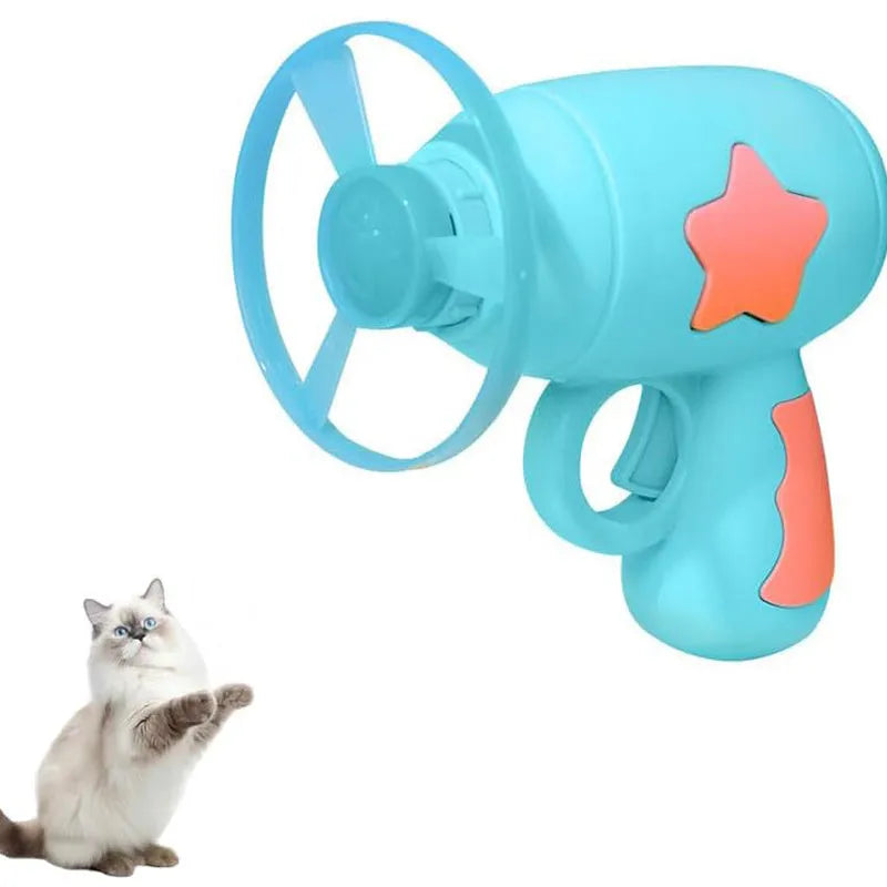 Blue interactive cat toy gun with plastic Frisbee on launch mechanism for indoor hunting play