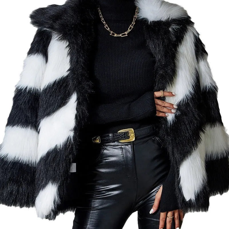 Women's faux fur coat with contrast colour lapels and a removable fur collar.