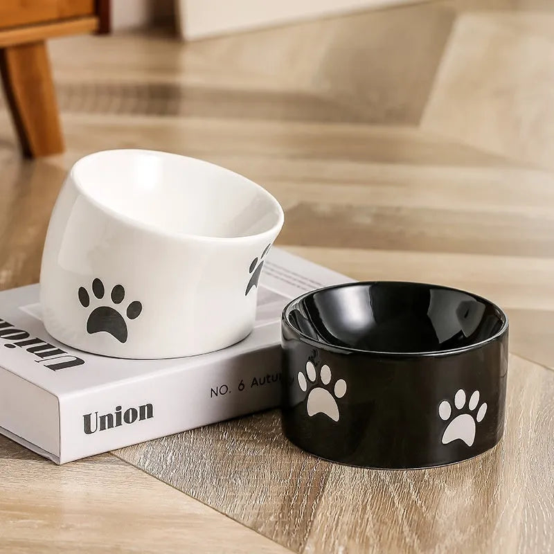 Ceramic cat bowl with high foot design in cat's paw pattern available in multiple colours