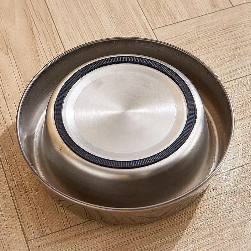 Thick stainless steel pet bowl with non-slip base, anti-fall rim, and bite-resistant construction
