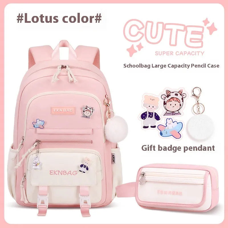 Girls' pink waterproof Oxford cloth school backpack with curved shoulder straps.