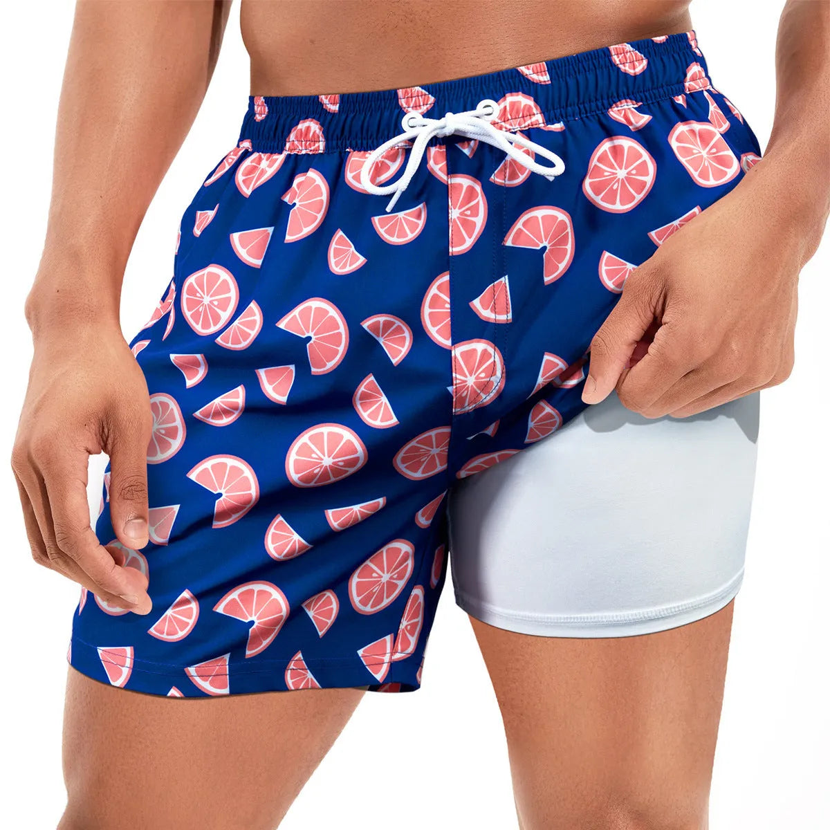 Men's loose fit quick-drying boxer swimming trunks in a selection of floral and tropical print designs.
