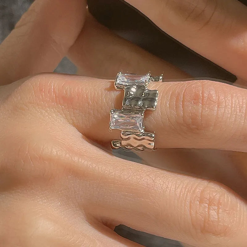 Geometric open design zircon ring with silver plating and 3D decoration