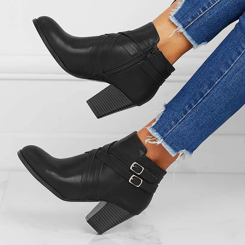 Plus size short ankle boots with a 7cm heel and side zip, shown in grey, black and brown.