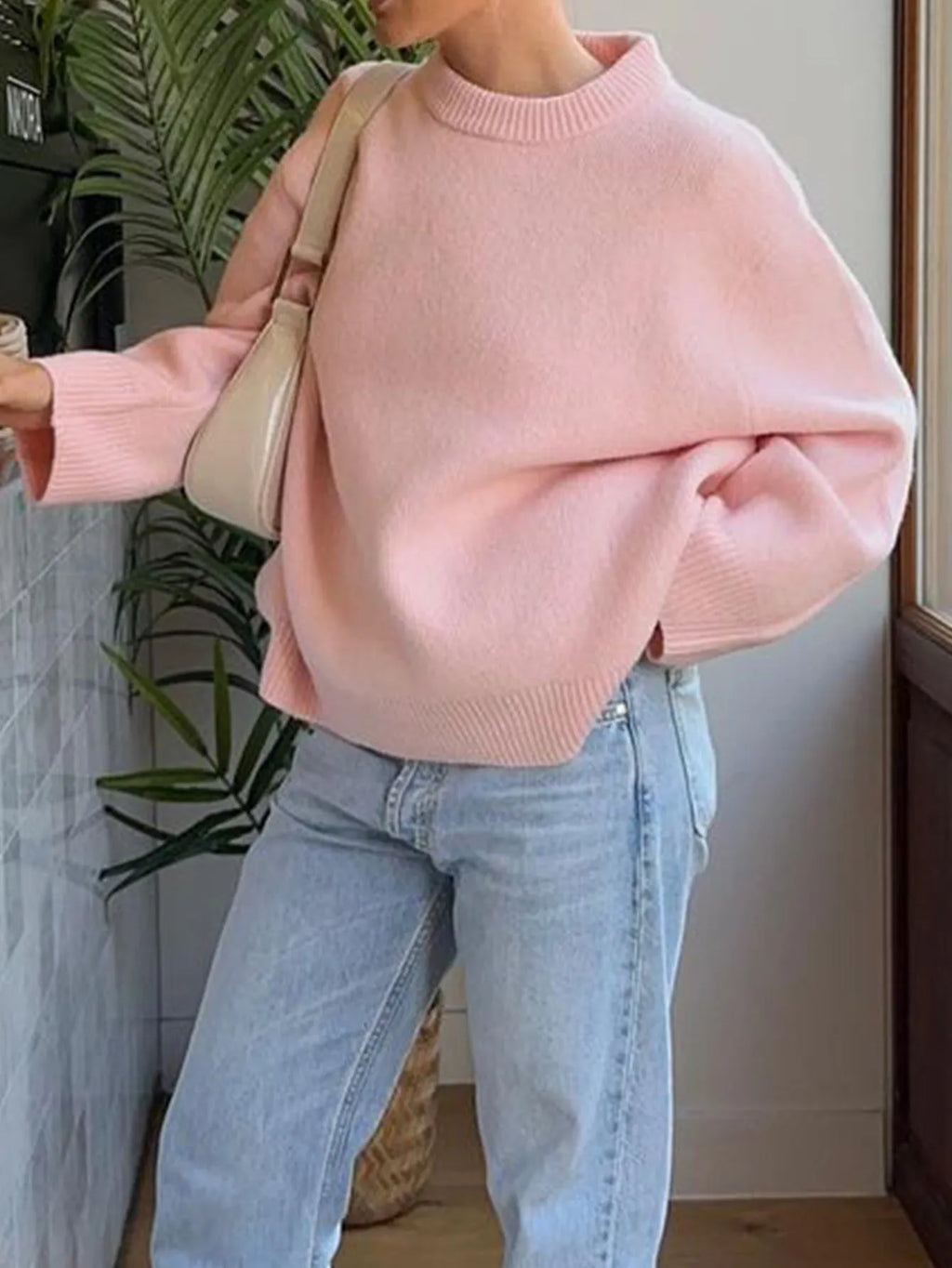 Casual solid colour long-sleeved polyester pullover sweater in light blue, front view