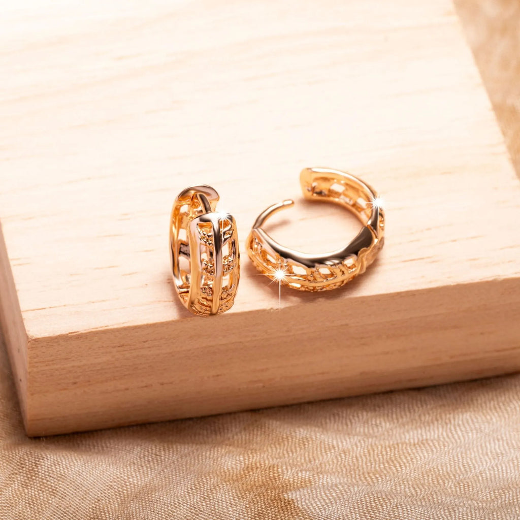 Rose gold copper leaf hollowed out earrings with a heart shape design.