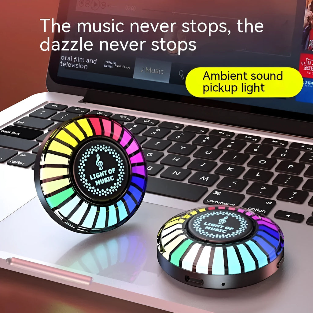 Black desktop RGB ambience light with magnetic base on metallic surface