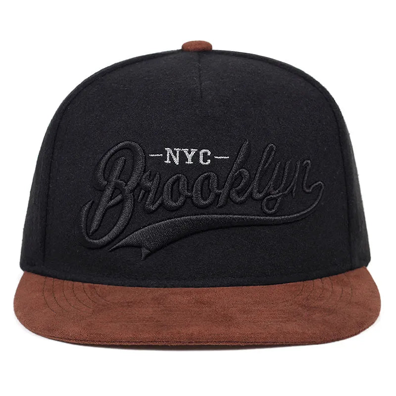 Adjustable cotton baseball cap with embroidered letters, dome top, short curved brim, in black and red for outdoor use