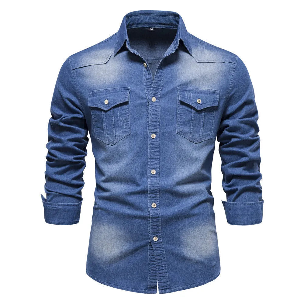 Men's slim fit long sleeve denim shirt in a solid colour on a hanger.