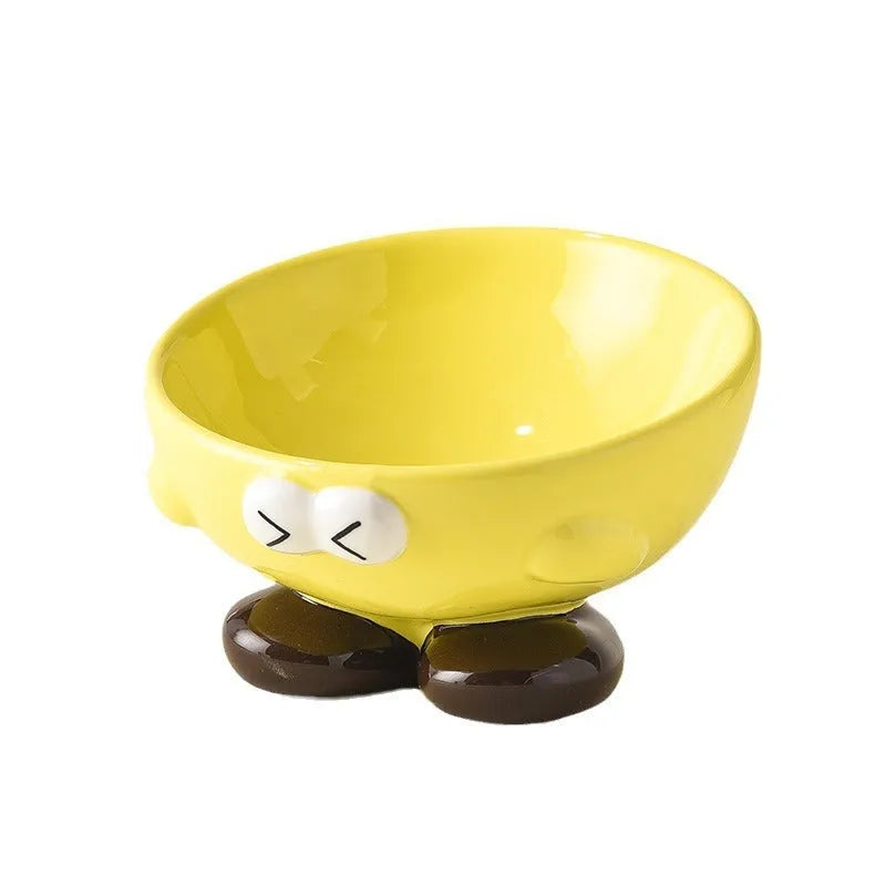 Tall blue ceramic slanted pet bowl with cute expression, designed for cervical spine support.