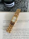 Bracelet-style women's vintage watch with 15mm mineral glass dial and stainless steel back